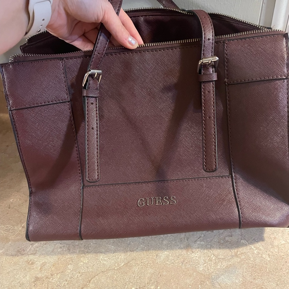 Large Guess bag gently used Maroon in color